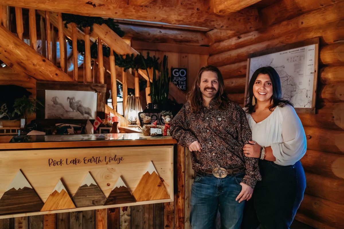 Cheanise and Brody at the lodge front desk