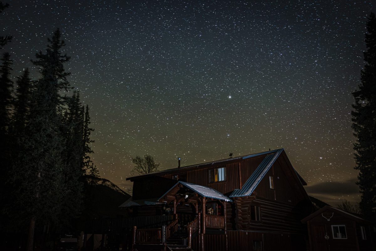 The main lodge under the stars at Rock Lake Earth Lodge