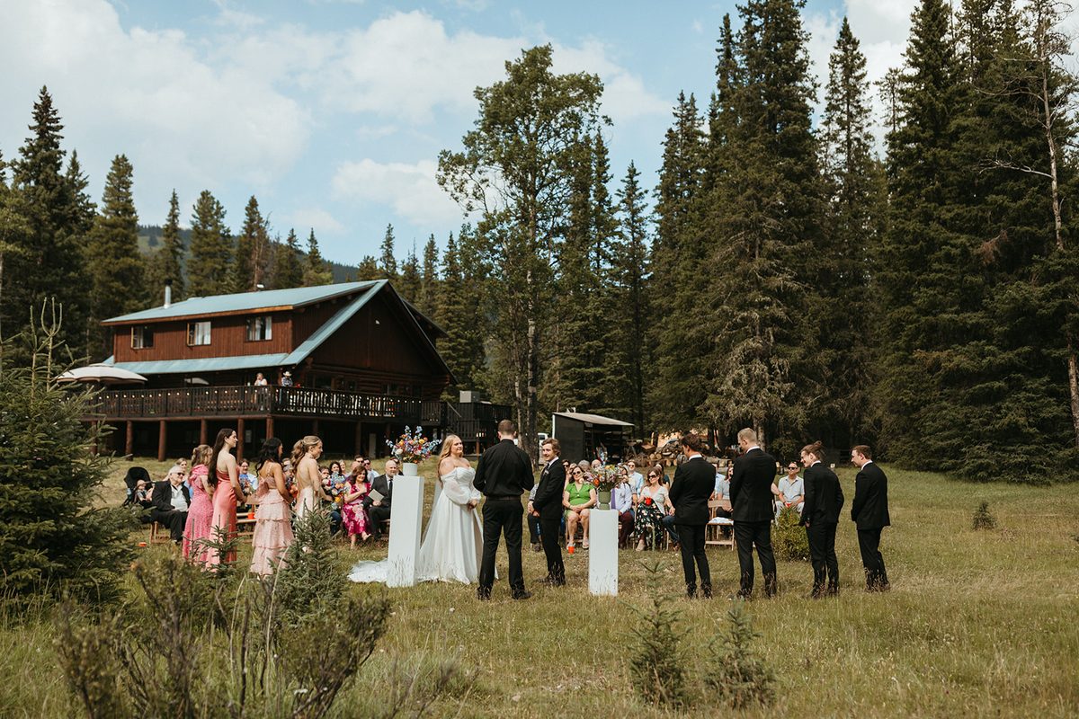 Newlyweds walking together at Rock Lake