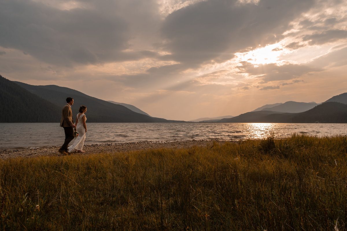 A first kiss at the altar at Rock Lake