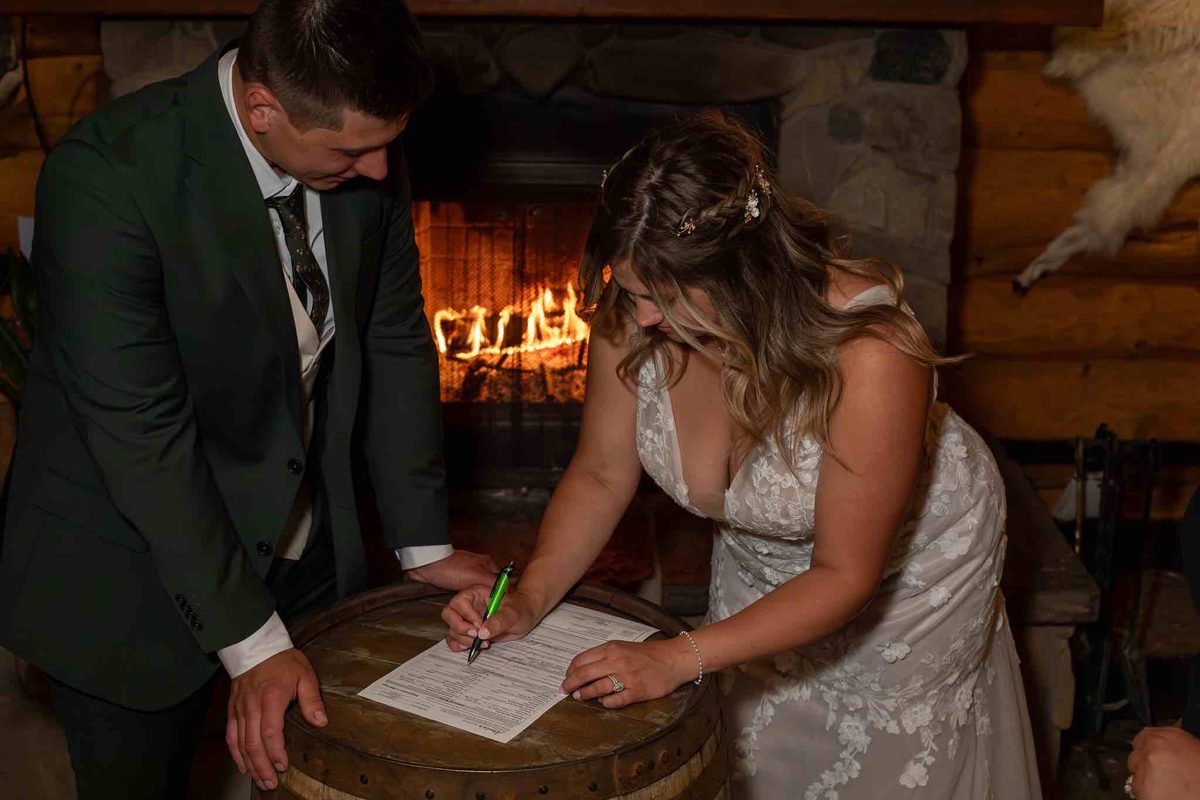 An intimate vow exchange at Rock Lake